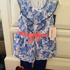Brand new with tags floral top with blue leggings
